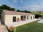 Construction d'une maison en agglos de 20 avec 2 rangées de génoises et garage de 26 m² intégré