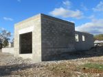 Élévation des murs du garage, coulage de la dalle et acrotère