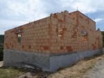 Elévation des murs en briques de 20 TH+ R=1.40