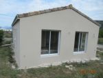 Façade finition gratté, chéneaux et descentes en zinc