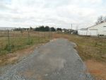 Réalisation d'une maison de plain-pied avec garage, terrasse couverte et garages + boxs de location