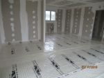 Réalisation de la mousse polyuréthane de 8 cms avant plancher chauffant