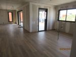 Réalisation du carrelage façon parquet