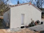 Habitation de plain-pied en Ytong avec garage, porche, terrasse et plancher chauffant