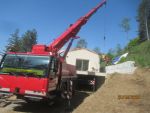 Pose des blocs et remplissage à la grue automotrice