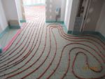 Pose des serpentins pour le plancher chauffant
