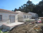 Première couche de la façade des 3 autres maisons